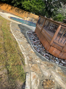 Landscaping around pools and enclosures